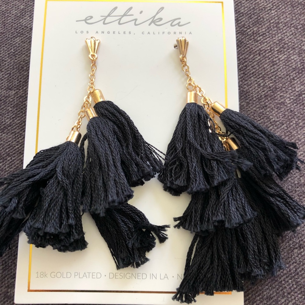 Ettika black tassel earrings.